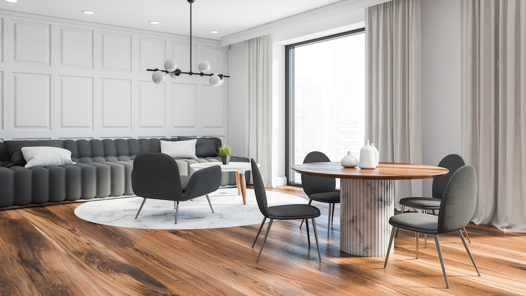 White dining room corner with sofa